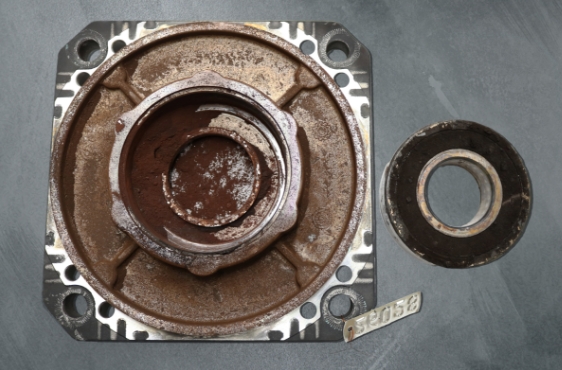 Loose bearing fits that were identified and replaced by our servo motor repair technicians