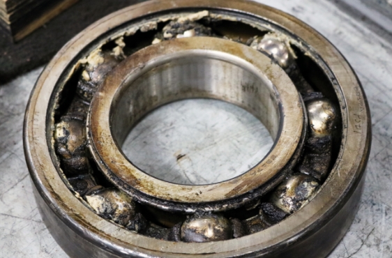 Bad servo motor bearings that needed to be removed and replaced during the motor refurbishment process